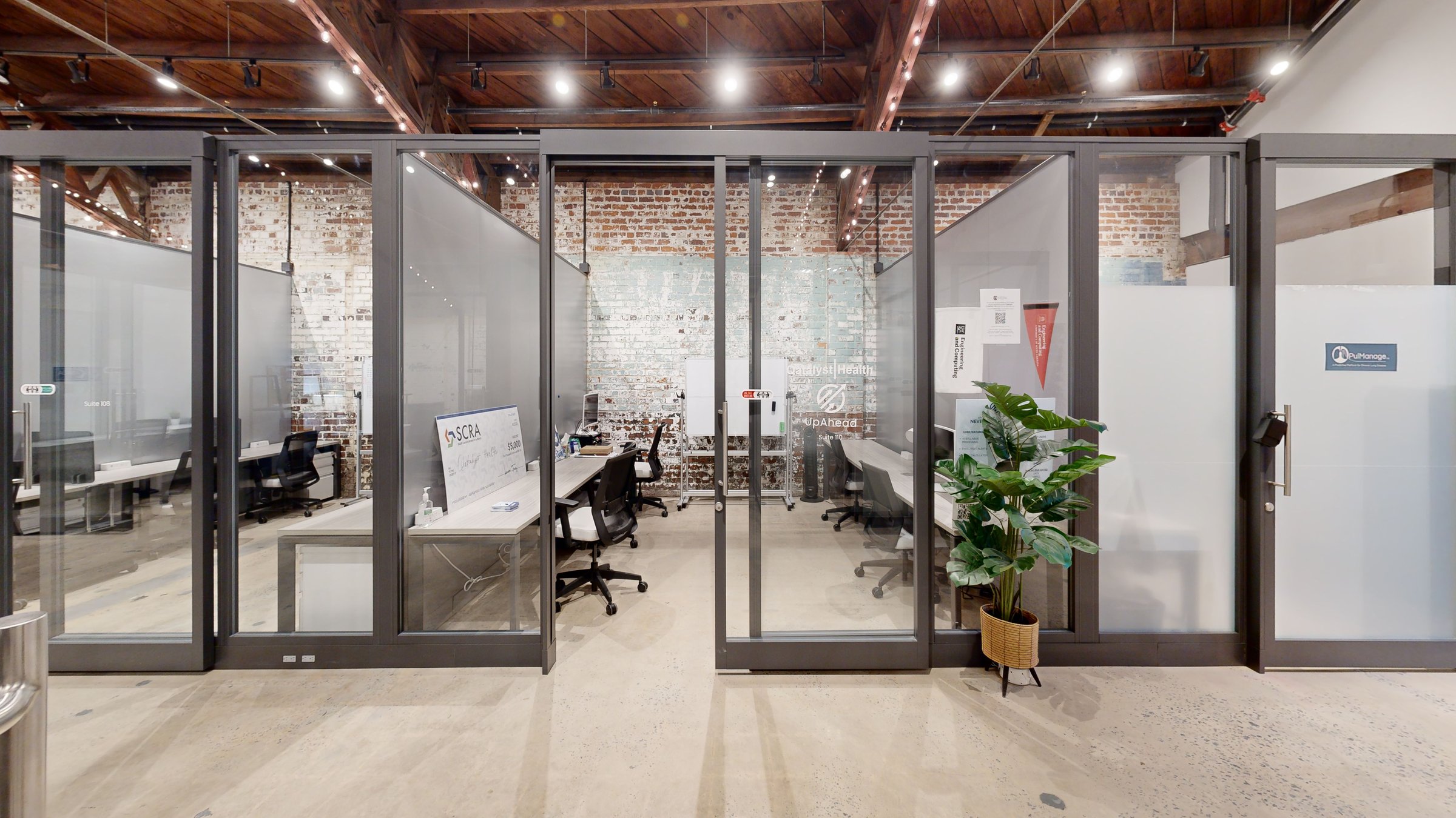 Glass-walled private offices at Boyd Innovation Center, Columbia, SC