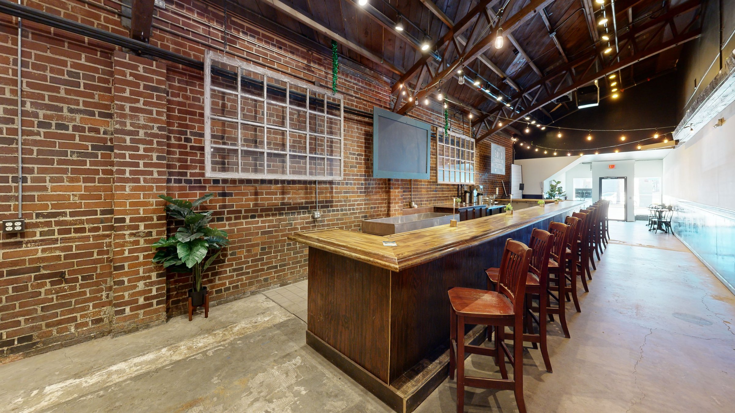 Brick-walled lounge and bar at Boyd Innovation Center, captured in a Matterport 3D scan