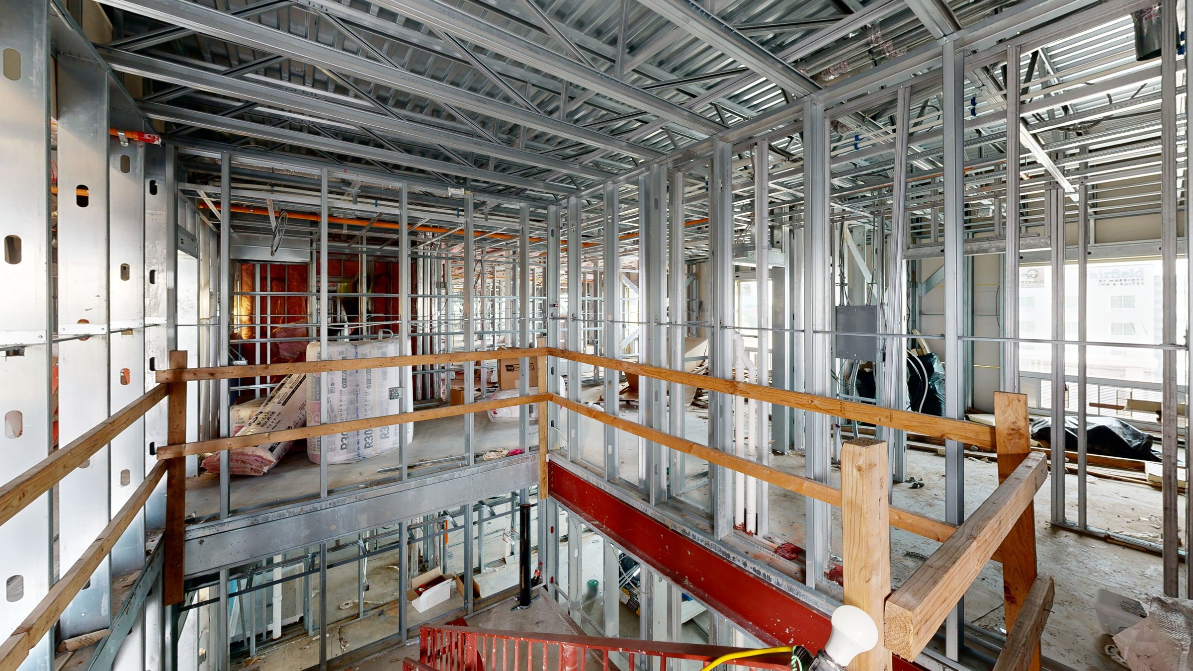 Hilton hotel under construction in Shawnee, Oklahoma, open stairwell and framing