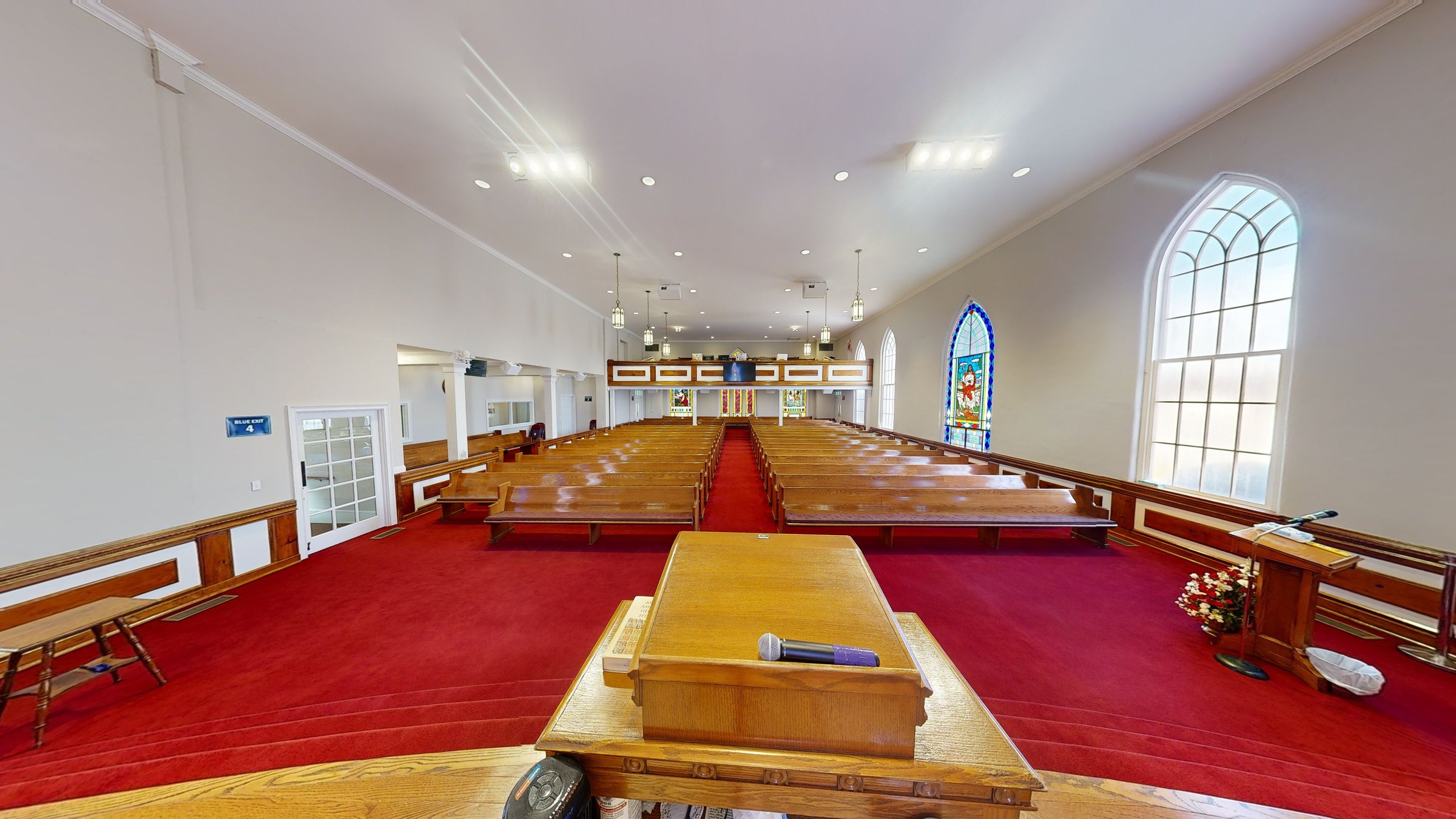 Sanctuary pews at Trinity Baptist Church, captured in a Matterport 3D scan